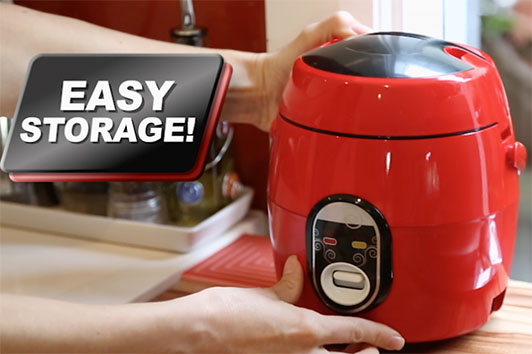 The red Kleva Cooker is small and clever for easy storage