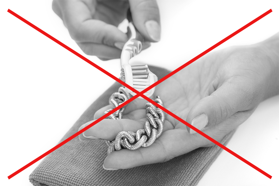 NEG-jewellery-cleaning-by-hand-toothbrush-scrubbing